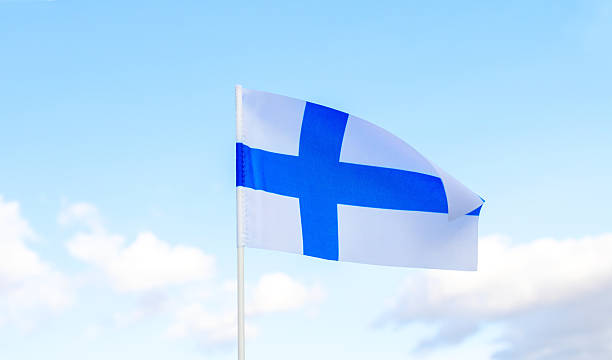 istock Finland flag on blue sky background. 2227430945