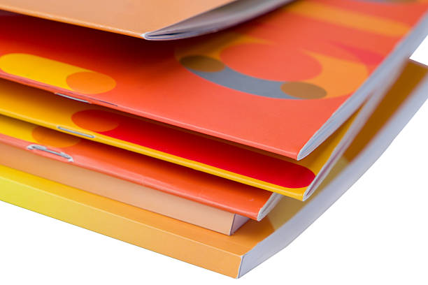 istock Stack of colorful magazine isolated on white background, clipping path 2227433261