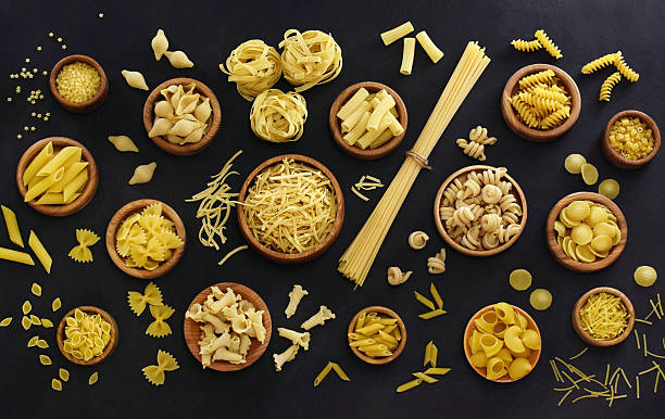 istock Mix of pasta shapes varieties 2227433498