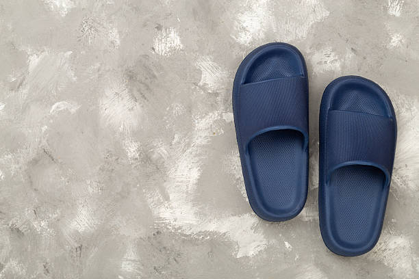 istock Blue sandals on concrete background,top view 2227433864