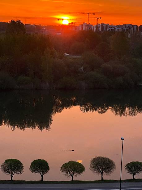 istock Sunset over Svislach River in Minsk, landscaped public park 2227436986