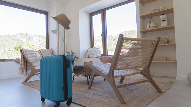 suitcase ready for traveling in a living room