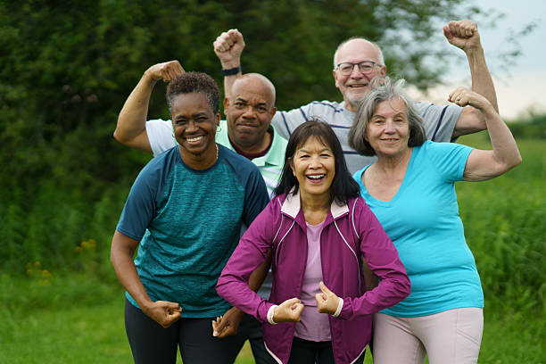 istock Group of Active Seniors Posing Outdoors Showing Strength and Happiness 2227440849