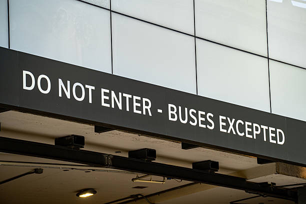 istock View of Do Not Enter - Buses Excepted sign on building wall. 2227443589