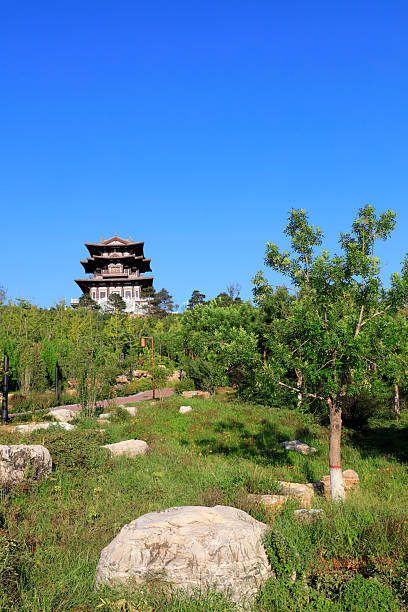 istock Chinese ancient architecture in a park 2227444256