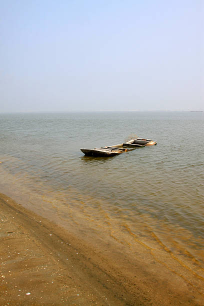 istock Fishing boats broken water 2227444655