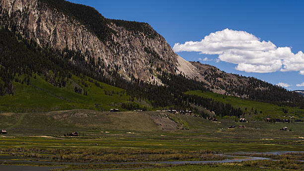 istock Rocky cliffs tower over meadow. Rugged landscape in Gunnison County, Colorado. 2227444665