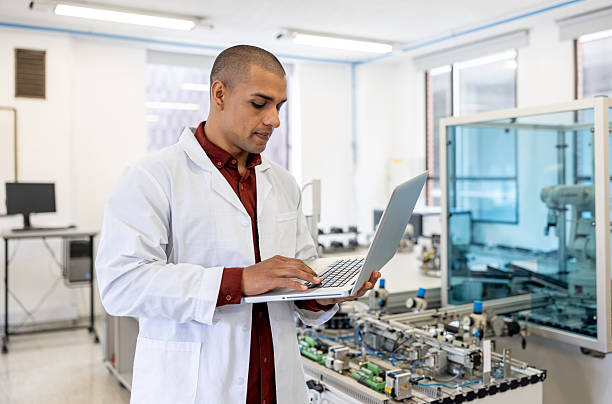 istock Post-graduate student operating a production line robot at the university 2227445715