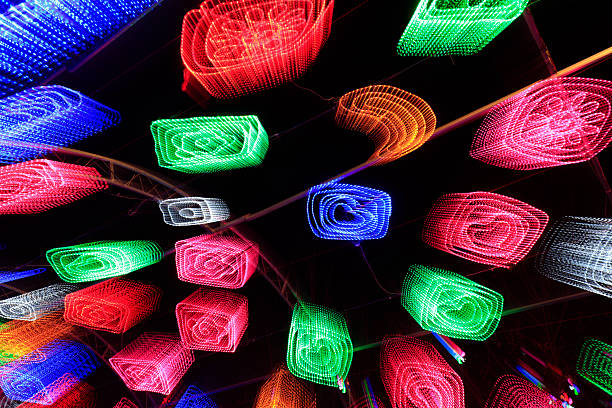Color rays in the dark background.