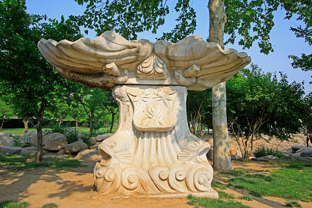 stone sculpture in a park, closeup of photo