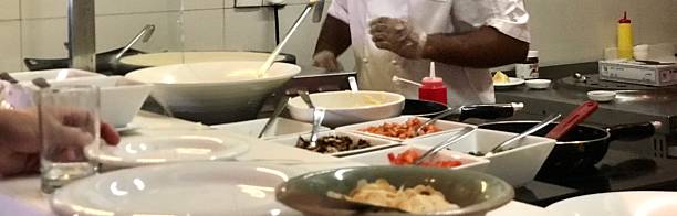 istock Hotel breakfast cooking station making egg omelette. 2227453828