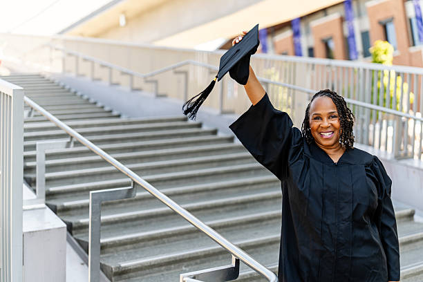 istock An Older Graduate with Cap and Gown 2227454391