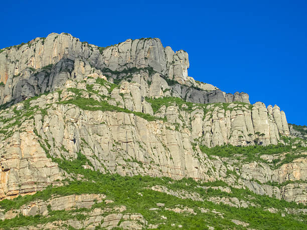 istock Montserrat mountains Spain: united rock formations, scenic peaks, and rugged limestone cliffs 2227455511