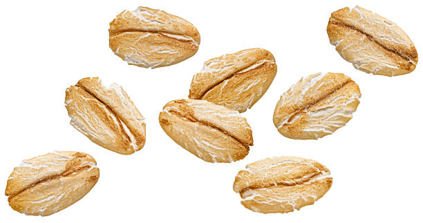 istock Falling oat flakes isolated on white background with clipping path 2227456355