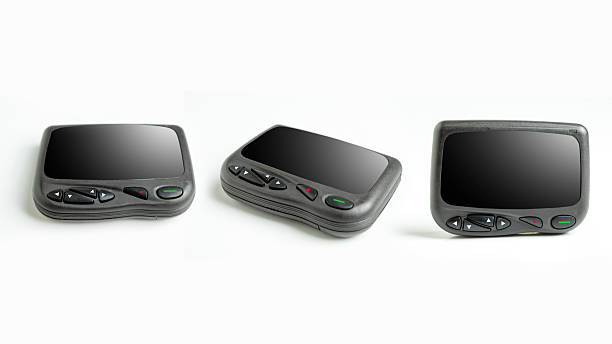 istock Set of black old pagers with different angle views isolated over a white background. Vintage gadget of a communication device 2227467190
