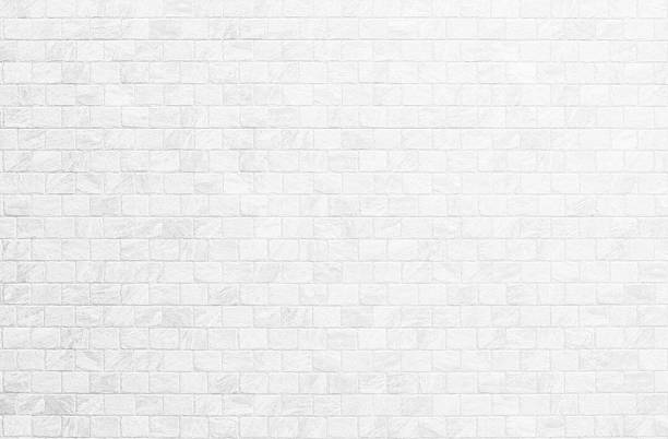 istock Wallpaper concept: Close up modern white brick tiles wall texture background. 2227469035