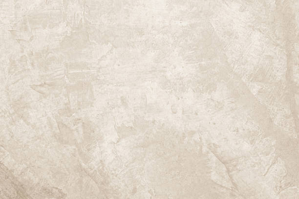 istock Colour old concrete wall texture background. Close up retro plain cream color cement wall background texture. 2227469037