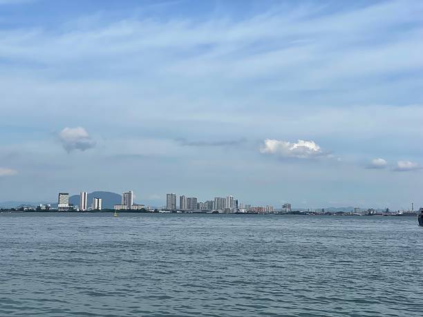 istock Urban Waterfront Skyline Across Calm Bay in Penang 2227474002