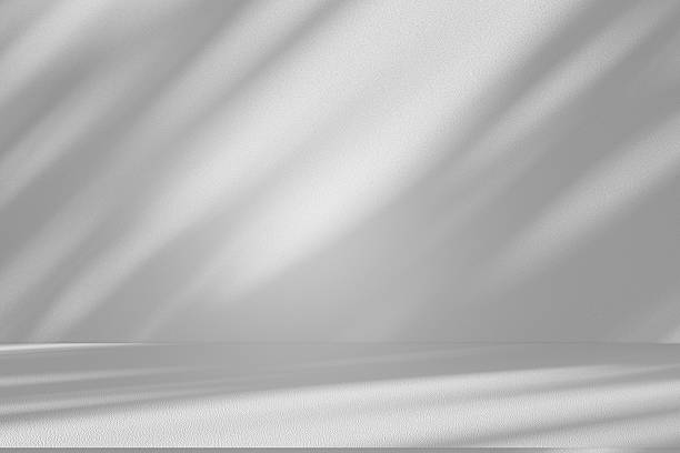 istock Wall interior background, studio and backdrops show products.with shadow from window color white . background for text insertion and presentation product 2227477875