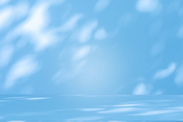 istock Studio style background wall decoration presentation uses white and blue tones. with shadows cast from a nearby window, concept creating a decorative 2227477896