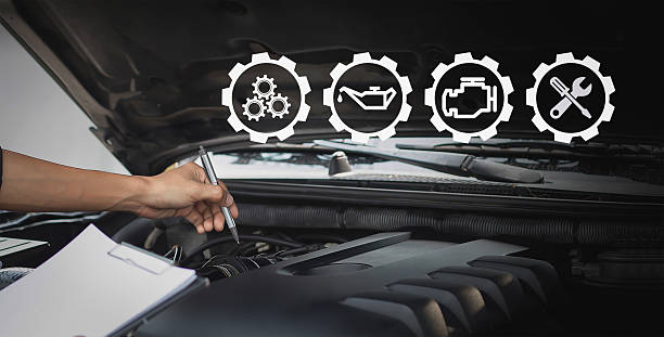 istock Auto mechanic checks engine repair list service concept 2227481638