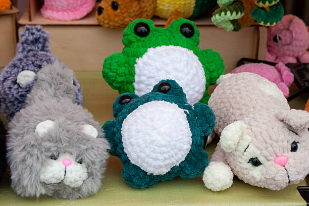 istock New soft knitted toys, hand made from yarn. 2227482074