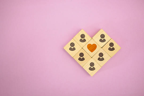 istock People Network Centered with Heart Icon on Wooden Blocks 2227482527