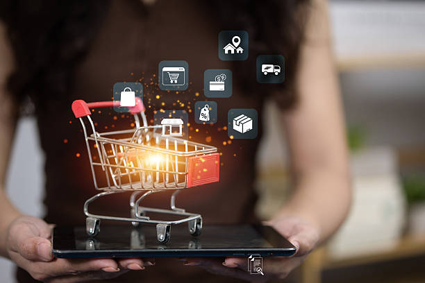 istock Online shopping cart with ecommerce icons on tablet 2227482650