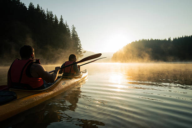 istock Serene moment shared between a couple on a kayak in the morning. 2227482912