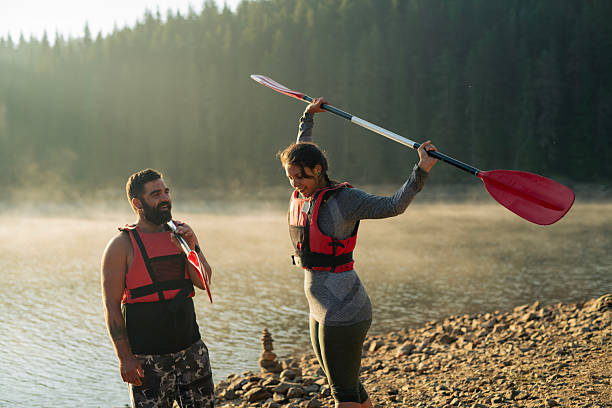 istock Happy couple ready for a kayak adventure. 2227482913