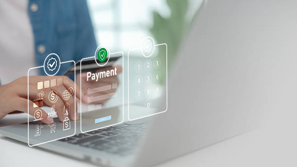 istock User interacting with secure digital payment interface on laptop. Concept of online transaction, fintech platform, financial technology, e-wallet, card payment, and cybersecurity solution. 2227487286