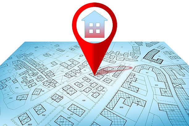 istock Searching new home - concept with an imaginary cadastral map of territory with buildings and home icon 2227489631
