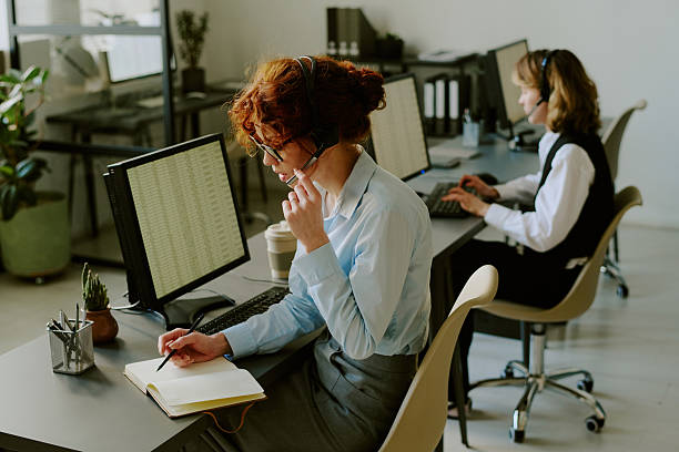 istock Focused Office Workers Engaging in Business Activities 2227496144