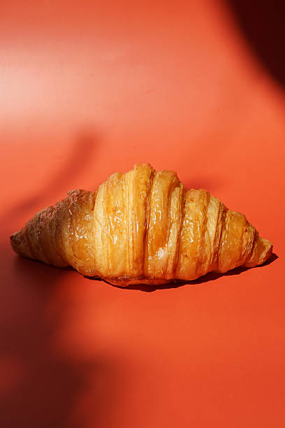 istock Close up plain butter croissant on marbled background 2227497517