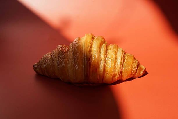 istock Close up plain butter croissant on marbled background 2227497519