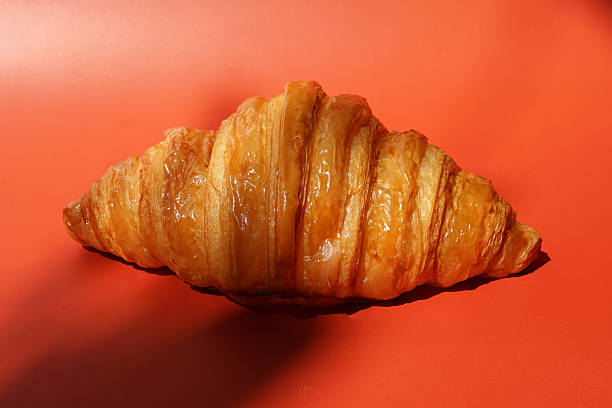 istock Close up plain butter croissant on marbled background 2227497551