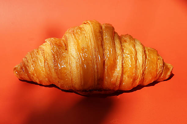 istock Close up plain butter croissant on marbled background 2227497554