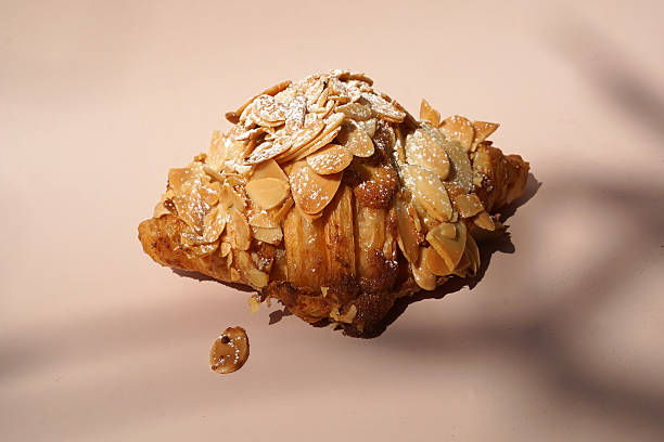 istock Close up Almond croissant on white table 2227497641
