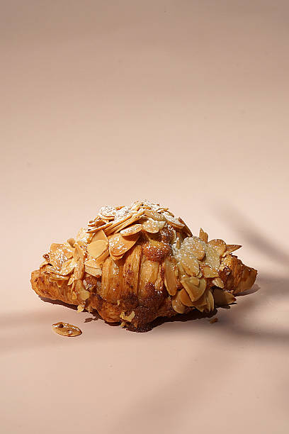 istock Close up Almond croissant on white table 2227497646