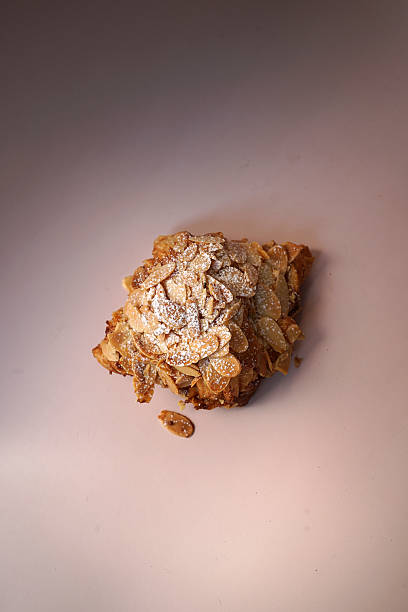 istock Close up Almond croissant on white table 2227497719