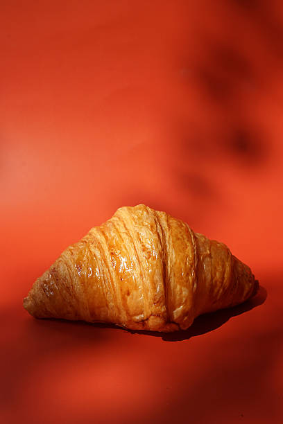 istock Close up plain butter croissant on marbled background 2227497840