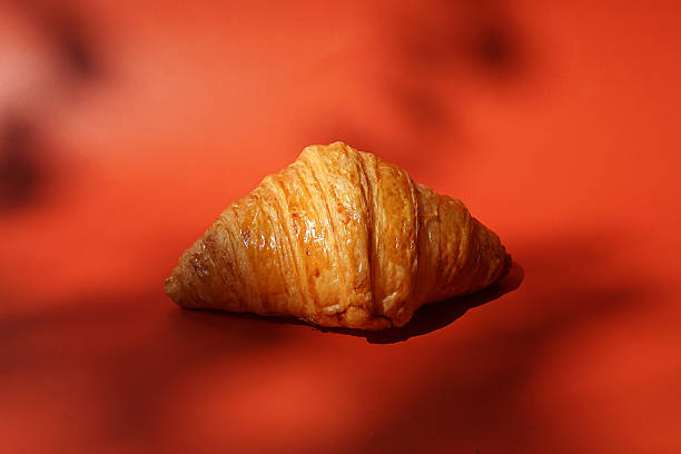 istock Close up plain butter croissant on marbled background 2227497842