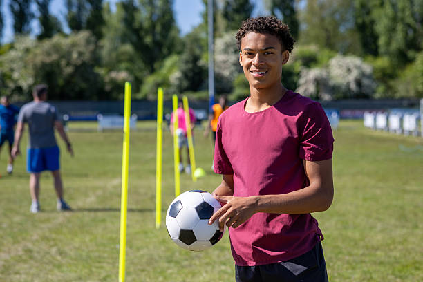 istock Confident Sportsman Posing with Ball 2227501306