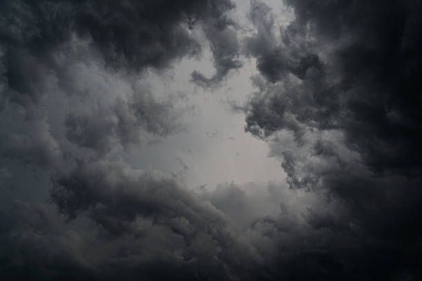istock Dark gray storm clouds before rain. Bad weather, darkness, death. 2227506698