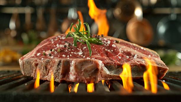 istock Close-up of Beef Steak on a Grill 2227506713