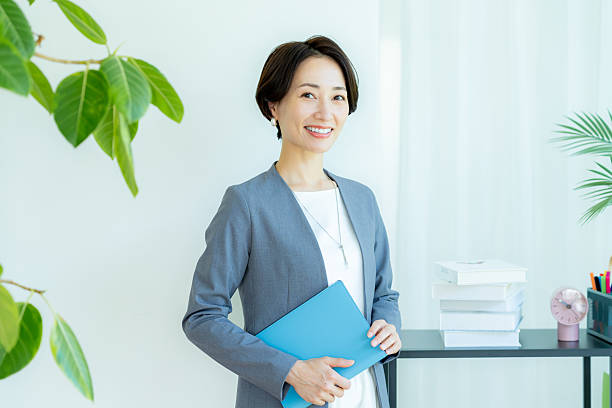 istock business woman working in the office 2227508764