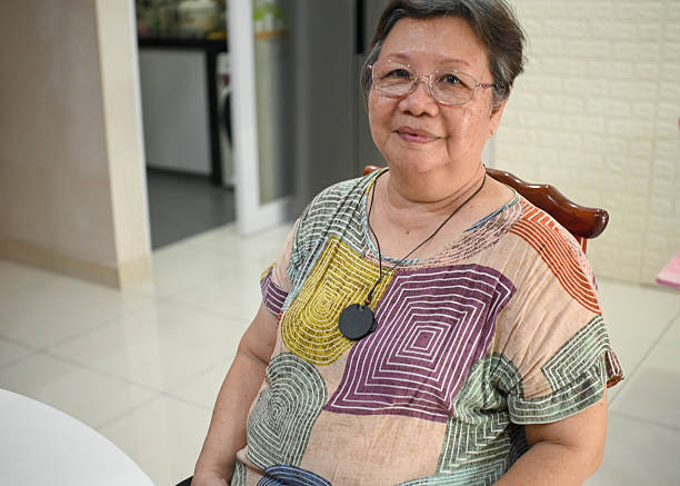 istock Elderly Woman at Home with Thoughtful Expression 2227510234