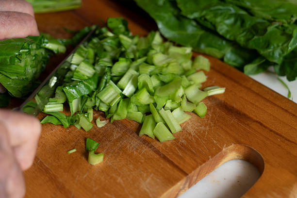 Freshly chopping chard on cutting board