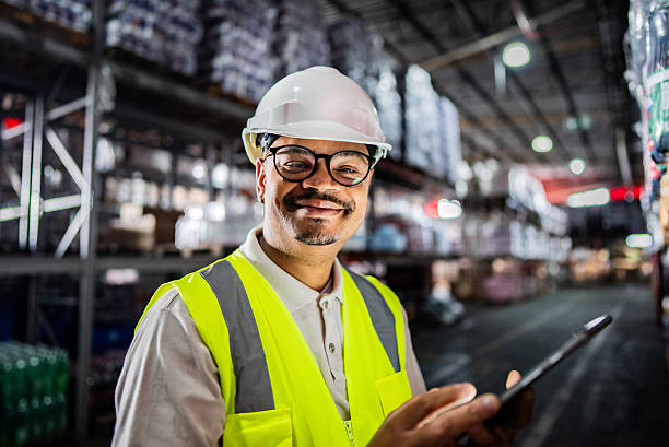 istock Portrait of an employee working on a digital tablet in a warehouse 2227514948