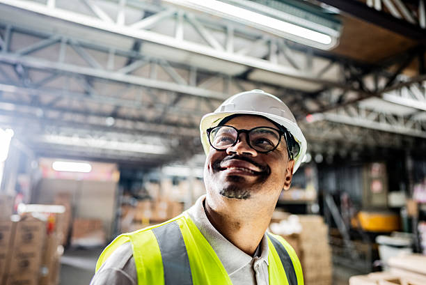 istock Employee walking looking around in a warehouse 2227514949